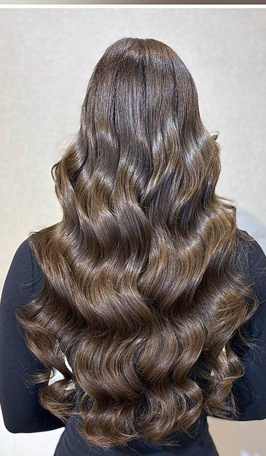 Ash brown waves after extensions at PhiStudio Dubai