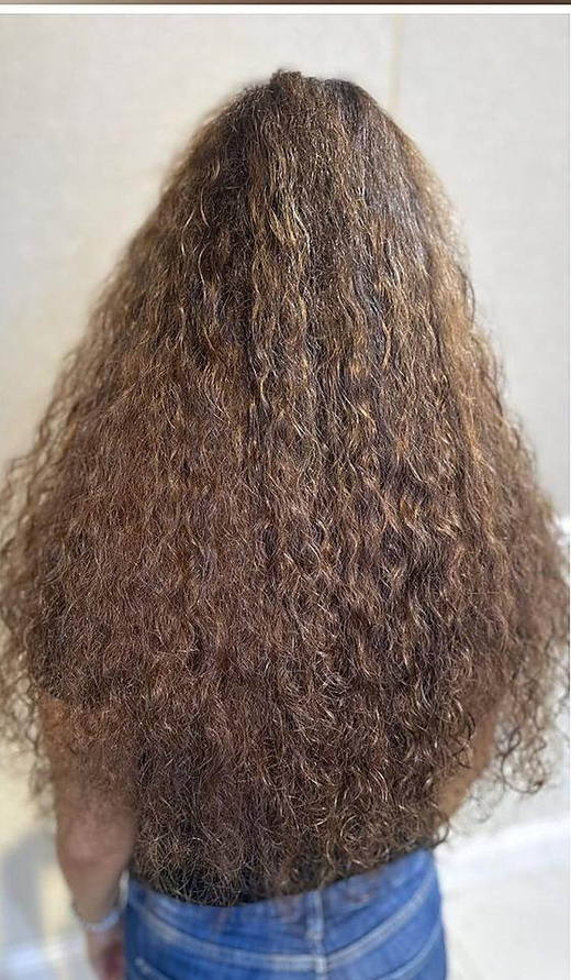 Curls, lengthened after extensions at PhiStudio Dubai