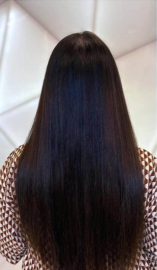 Deep brown shine after extensions at PhiStudio Dubai