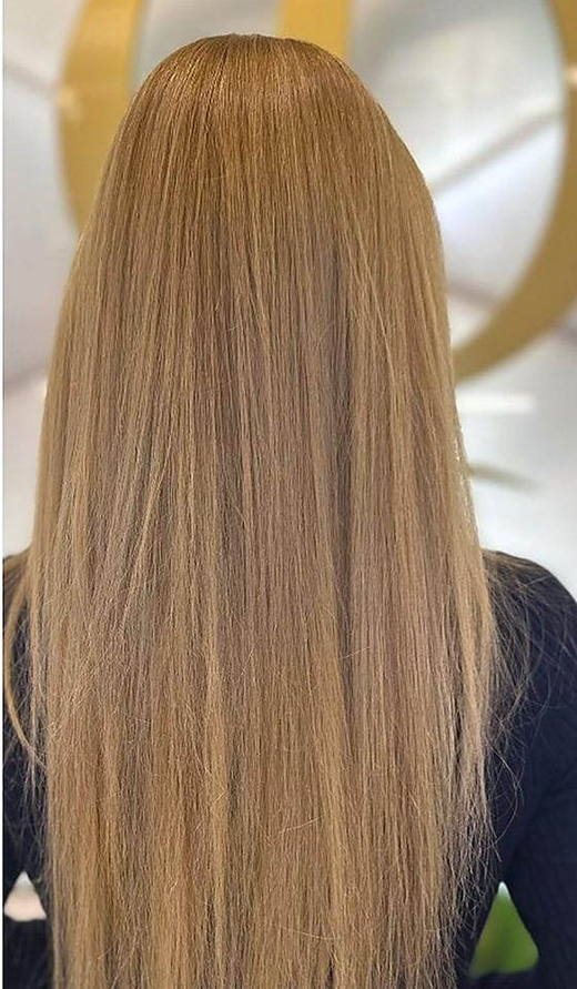 Icy blonde waves before extensions at PhiStudio Dubai