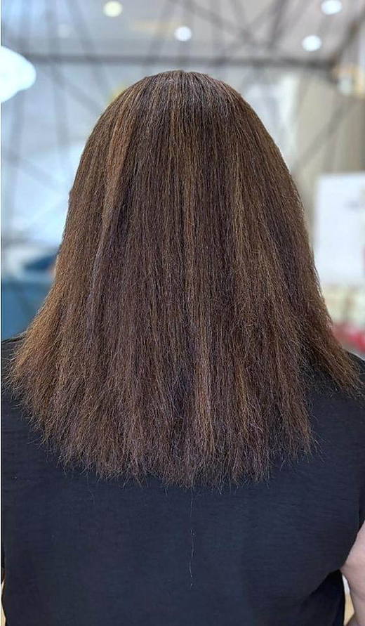 Warm brown length before extensions at PhiStudio Dubai